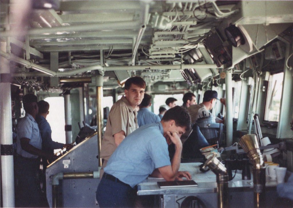 Peter Jessen on the bridge of USS Boulder as Navigation Officer